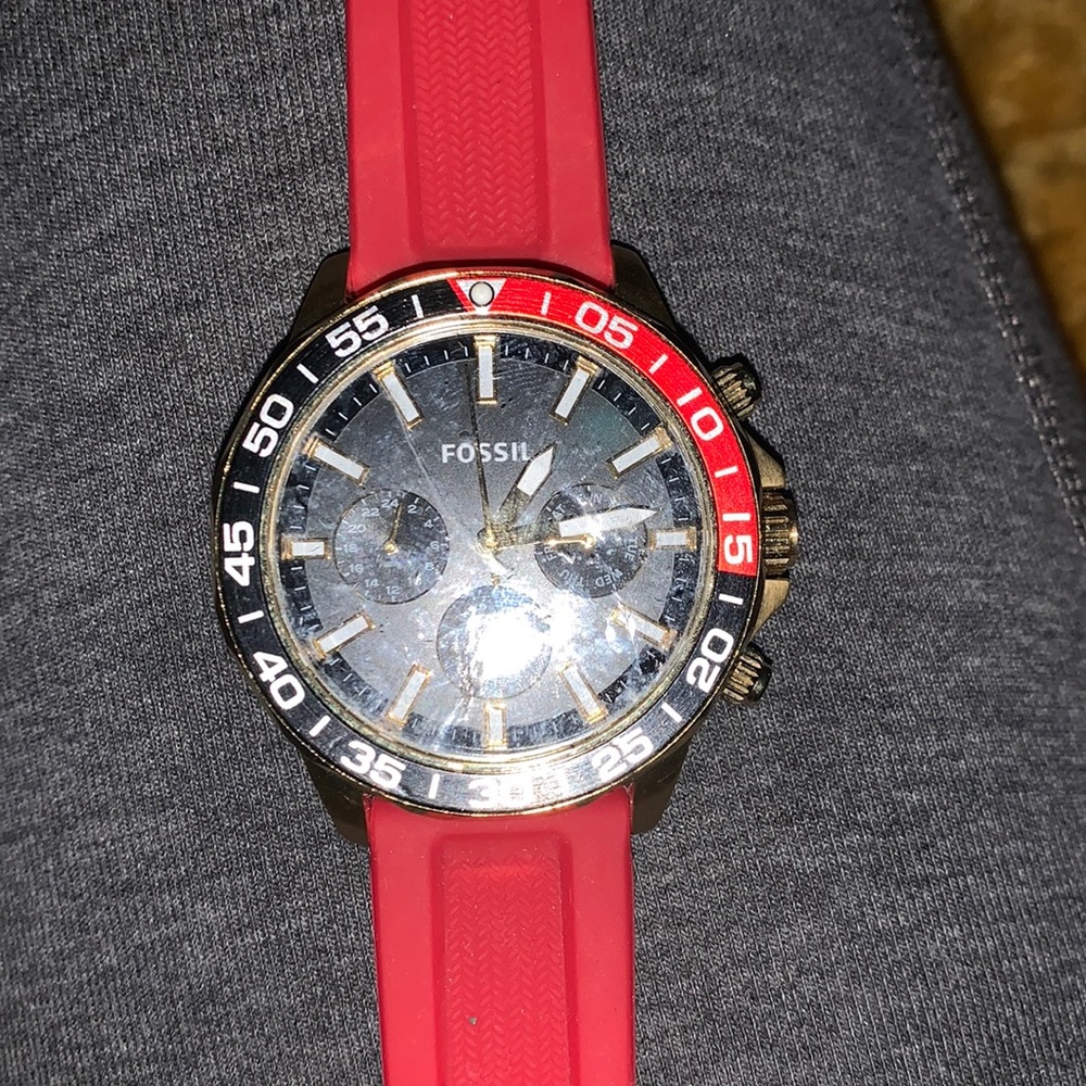 Fossil Red, black , and gold unisex watch